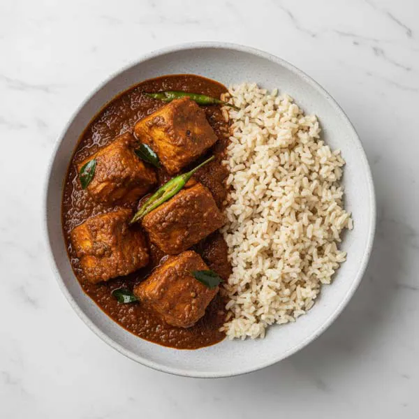 Fish pulimunchi with steamed brown rice